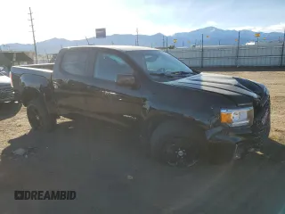 2021 GMC Canyon 4WD AT4 w/Cloth with VIN 1GTG6FEN9M1254293, listed as a Copart auction lot 87163874 with 33,645 mi miles and Salvage Title. Bid and sale history available at carsss.com. Image 4.