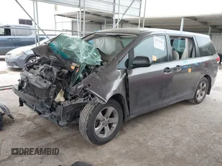 2014 Toyota Sienna L with VIN 5TDZK3DC5ES475204, listed as a IAAI auction lot 41277584 with 125,735 mi miles. Bid and sale history available at carsss.com. Image 16.