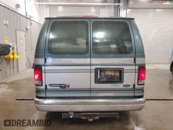 1995 Ford Econoline Cargo with VIN 1FDEE14H9SHA53311, listed as a Copart auction lot 82028894 with 112,647 mi miles and Clean Title. Bid and sale history available at DreamBid. Image 6.