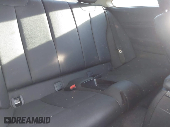 2015 BMW 2 Series 228i with VIN WBA1F5C53FV257086, listed as a IAAI auction lot 40898527 with 83,779 mi miles. Bid and sale history available at carsss.com. Image 8.