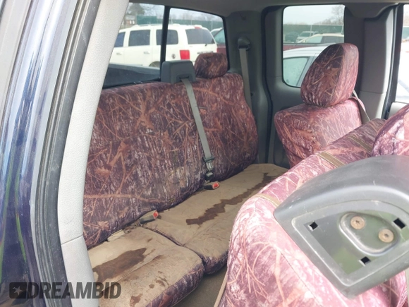 2005 Ford F-150 XLT with VIN 1FTPX12565NA61341, listed as a IAAI auction lot 41693609 with 401,988 mi miles. Bid and sale history available at carsss.com. Image 8.