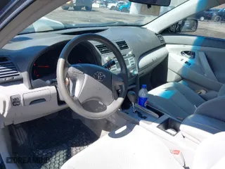 2007 Toyota Camry CE with VIN 4T1BE46KX7U115813, listed as a IAAI auction lot 41803314 with 165,233 mi miles. Bid and sale history available at carsss.com. Image 5.