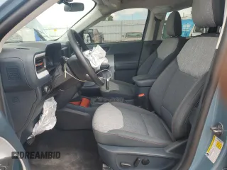 2023 Ford Maverick XL with VIN 3FTTW8F9XPRA99145, listed as a Copart auction lot 56218175 with 15,697 mi miles and Salvage title. Bid and sale history available at DreamBid. Image 7.