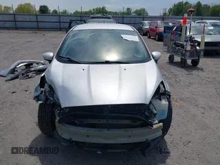 2019 Ford Fiesta SE z VIN 3FADP4EJ9KM107124, wystawiony jako IAAI lot #42067464 z przebiegiem 89 076 mil mil oraz . Historia ofert i sprzedaży dostępna na DreamBid. Obrazek 13.