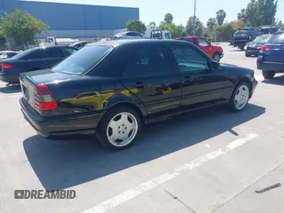 1999 Mercedes-Benz C with VIN WDBHA33G3XF889442, listed as a IAAI auction lot 42403800 with 82,075 mi miles and . Bid and sale history available at DreamBid. Image 4.