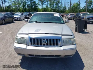 2007 Mercury Grand Marquis GS with VIN 2MEFM74VX7X616232, listed as a IAAI auction lot 42043452 with 331,491 mi miles. Bid and sale history available at carsss.com. Image 6.