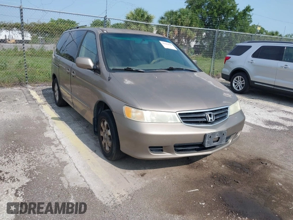2004 Honda Odyssey EX-L z VIN 5FNRL18954B014748, wystawiony jako IAAI lot #42389048 z przebiegiem 136 176 mil mil oraz . Historia ofert i sprzedaży dostępna na DreamBid. Obrazek 1.