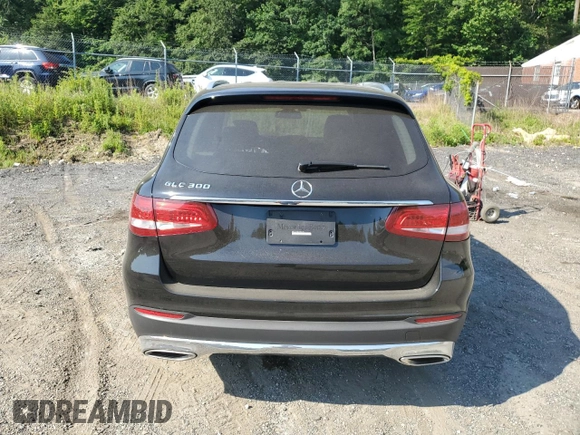 2018 Mercedes-Benz GLC 300 with VIN WDC0G4JB8JV061971, listed as a Copart auction lot 61849395 with 55,549 mi miles and Salvage title. Bid and sale history available at DreamBid. Image 6.