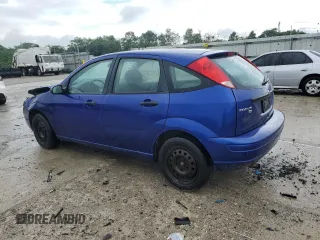 2005 Ford Focus S with VIN 3FAFP37N35R156460, listed as a Copart auction lot 58781635 with 231,066 mi miles and Salvage title. Bid and sale history available at DreamBid. Image 2.