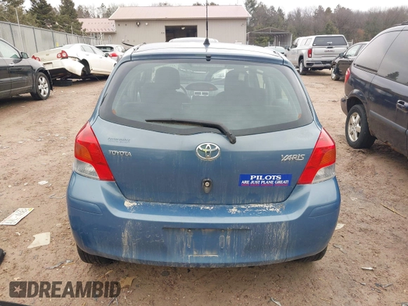 2009 Toyota Yaris with VIN JTDKT903195255240, listed as a IAAI auction lot 41650800 with 168,991 mi miles. Bid and sale history available at carsss.com. Image 16.