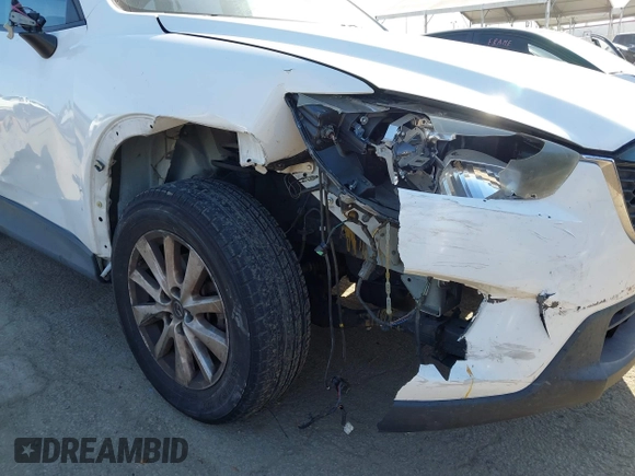 2013 Mazda CX-5 Sport with VIN JM3KE2BE4D0153251, listed as a IAAI auction lot 42297235 with 177,019 mi miles and . Bid and sale history available at DreamBid. Image 17.