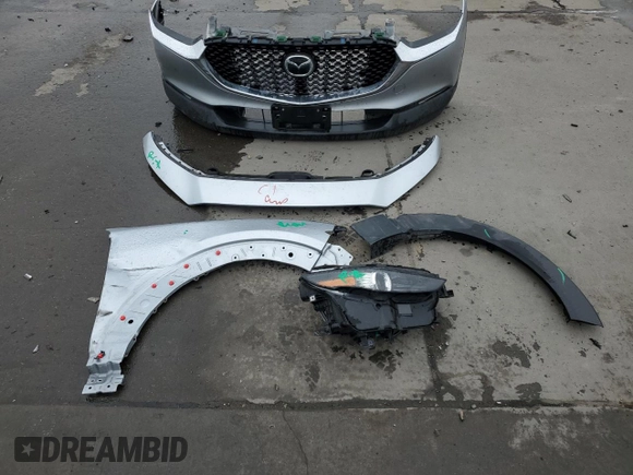 2021 Mazda CX-30 Preferred с VIN 3MVDMBCL5MM248575, выставлен на аукционе Copart как лот 52821575 с пробегом 47 364 миль миль и Списание • Salvage title. История ставок и продаж доступна на DreamBid. Изображение 13.