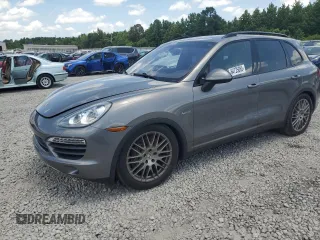 2012 Porsche Cayenne S Hybrid with VIN WP1AE2A24CLA93950, listed as a Copart auction lot 64725885 with Not provided miles and Clean title. Bid and sale history available at DreamBid. Image 1.