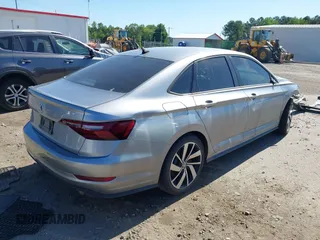 2021 Volkswagen Jetta GLI S с VIN 3VW6T7BU6MM047415, выставлен на аукционе IAAI как лот 42123627 с пробегом 63 111 миль миль и . История ставок и продаж доступна на DreamBid. Изображение 4.