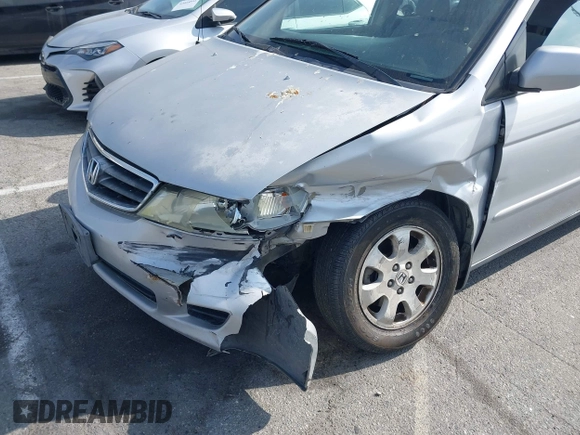 2004 Honda Odyssey EX with VIN 5FNRL18684B143038, listed as a IAAI auction lot 42083469 with 160,317 mi miles and . Bid and sale history available at DreamBid. Image 6.