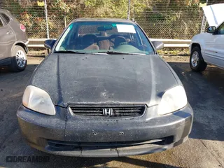 1997 Honda Civic EX with VIN 2HGEJ8645VH566736, listed as a IAAI auction lot 41876647 with 277,968 mi miles. Bid and sale history available at carsss.com. Image 12.