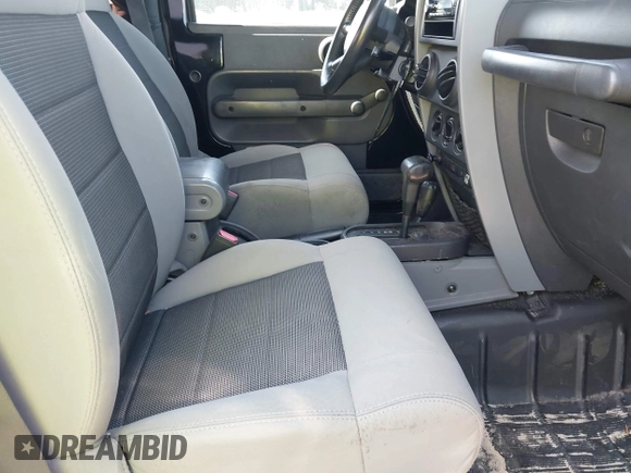 2009 Jeep Wrangler X with VIN 1J4FA24179L711352, listed as a IAAI auction lot 42577898 with 133,309 mi miles and . Bid and sale history available at DreamBid. Image 5.