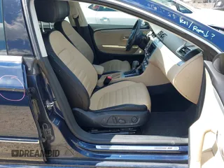 2014 Volkswagen CC R-Line with VIN WVWBP7AN7EE507463, listed as a IAAI auction lot 41984136 with 100,531 mi miles. Bid and sale history available at carsss.com. Image 5.