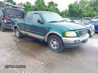 2000 Ford F-150 XL z VIN 1FTRX17L9YNA14700, wystawiony jako IAAI lot #42463519 z przebiegiem 148 629 mil mil oraz . Historia ofert i sprzedaży dostępna na DreamBid. Obrazek 1.