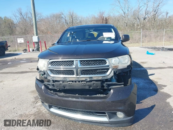 2012 Dodge Durango SXT with VIN 1C4RDHAG0CC196871, listed as a IAAI auction lot 41771399 with 254,779 mi miles and . Bid and sale history available at DreamBid. Image 12.