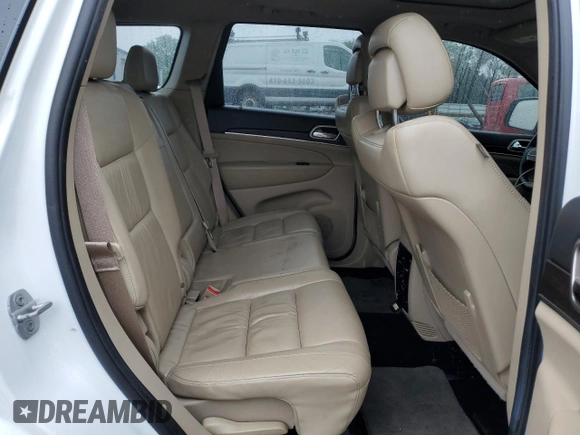 2014 Jeep Grand Cherokee Limited with VIN 1C4RJFBG9EC200141, listed as a Copart auction lot 60507385 with 101,917 mi miles and Salvage title. Bid and sale history available at DreamBid. Image 11.