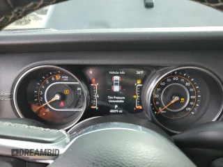 2021 Jeep Gladiator High Altitude с VIN 1C6HJTFGXML600395, выставлен на аукционе Copart как лот 50393625 с пробегом 45 079 миль миль и Списание • Salvage title. История ставок и продаж доступна на DreamBid. Изображение 9.