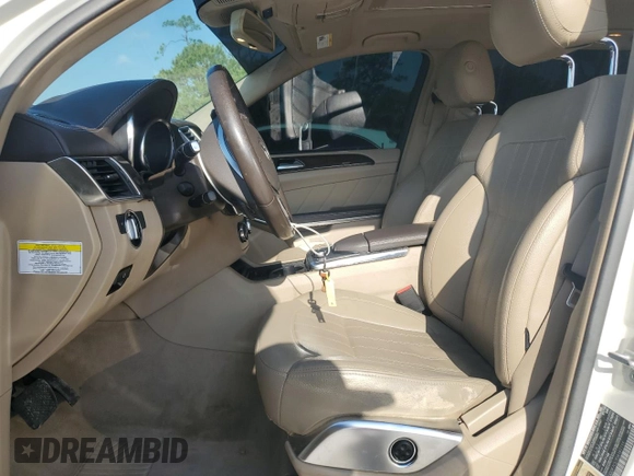 2013 Mercedes-Benz GL 450 z VIN 4JGDF7CE7DA181111, wystawiony jako Copart lot #56229585 z przebiegiem 114 517 mil mil oraz Czysty tytuł • Clean title. Historia ofert i sprzedaży dostępna na DreamBid. Obrazek 7.