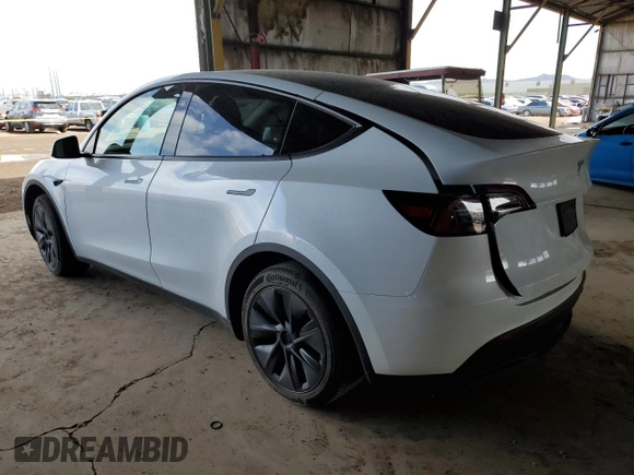 2024 Tesla Model Y Long Range with VIN 7SAYGDEE1RF165311, listed as a Copart auction lot 51711665 with 15,190 mi miles and Salvage Title. Bid and sale history available at DreamBid. Image 2.