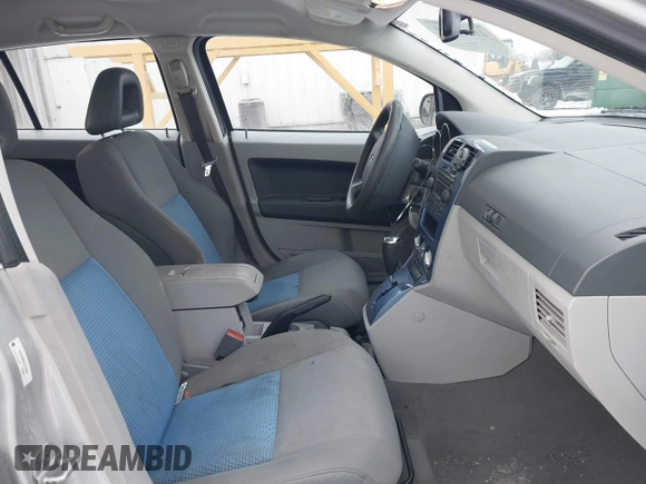 2007 Dodge Caliber SXT with VIN 1B3HB48B07D159549, listed as a IAAI auction lot 41330969 with 124,911 mi miles and . Bid and sale history available at DreamBid. Image 5.