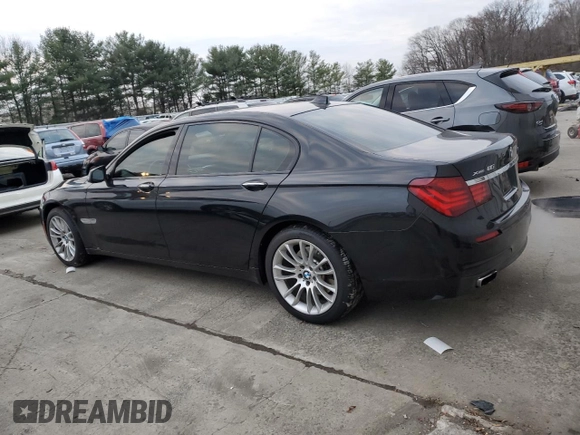 2014 BMW 7 Series 740Li xDrive with VIN WBAYF4C59ED281776, listed as a Copart auction lot 83563234 with 77,899 mi miles and Salvage Title. Bid and sale history available at carsss.com. Image 2.