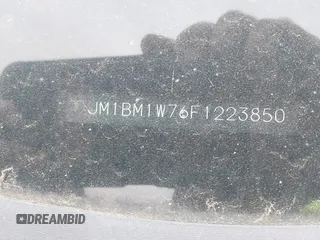 2015 Mazda 3 i Grand Touring z VIN JM1BM1W76F1223850, wystawiony jako IAAI lot #42356420 z przebiegiem 45 514 mil mil oraz . Historia ofert i sprzedaży dostępna na DreamBid. Obrazek 9.