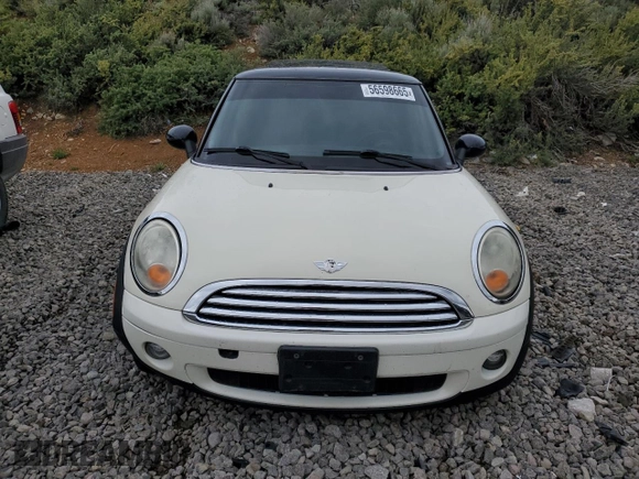 2007 MINI Hardtop with VIN WMWMF33567TT56922, listed as a Copart auction lot 56598665 with 66,605 mi miles and Salvage title. Bid and sale history available at DreamBid. Image 5.