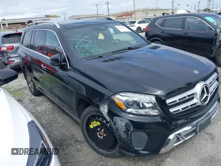 2018 Mercedes-Benz GLS with VIN 4JGDF6EEXJB044080, listed as a IAAI auction lot 41694984 with 91,128 mi miles. Bid and sale history available at carsss.com. Image 1.