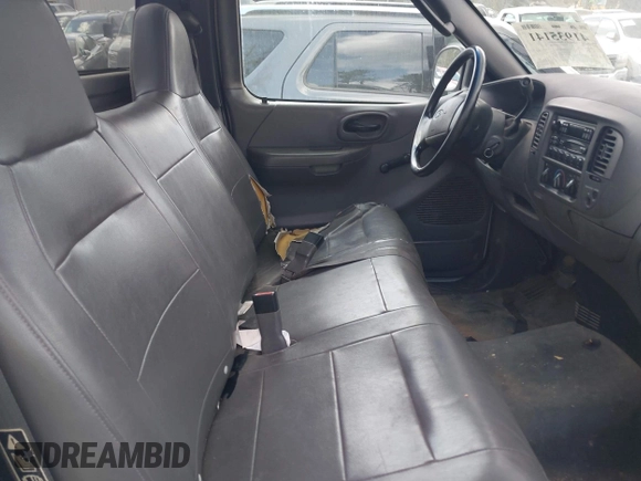 2004 Ford F-150 XL with VIN 2FTRF17W24CA02353, listed as a IAAI auction lot 41935141 with 306,280 mi miles and . Bid and sale history available at DreamBid. Image 5.