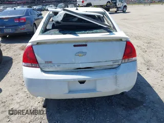 2014 Chevrolet Impala LT with VIN 2G1WB5E30E1136153, listed as a IAAI auction lot 39848599 with 126,676 mi miles and . Bid and sale history available at DreamBid. Image 16.