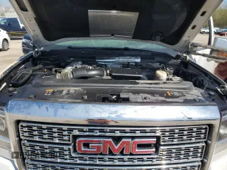 2019 GMC Sierra 2500HD Denali z VIN 1GT12SEY2KF106040, wystawiony jako Copart lot #54123885 z przebiegiem 153 684 mil mil oraz Szkoda całkowita • Salvage title. Historia ofert i sprzedaży dostępna na DreamBid. Obrazek 11.