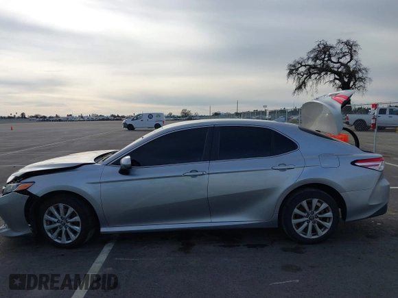 2019 Toyota Camry LE with VIN 4T1B11HK7KU803624, listed as a IAAI auction lot 41589107 with 169,863 mi miles and . Bid and sale history available at DreamBid. Image 14.