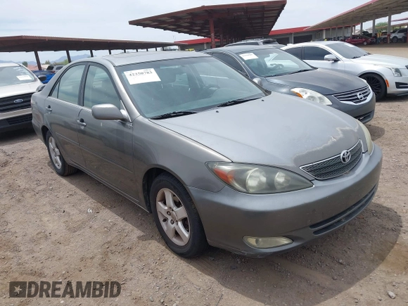 2003 Toyota Camry LE with VIN JTDBE32K530236769, listed as a IAAI auction lot 42250783 with 194,445 mi miles and . Bid and sale history available at DreamBid. Image 1.