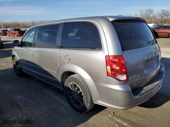2016 Dodge Grand Caravan SE with VIN 2C4RDGBG3GR153146, listed as a Copart auction lot 45012064 with 104,880 mi miles and Salvage Title. Bid and sale history available at carsss.com. Image 2.