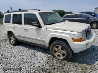 2010 Jeep Commander Sport with VIN 1J4RH4GK0AC103539, listed as a Copart auction lot 54136675 with 243,238 mi miles and Clean Title. Bid and sale history available at carsss.com. Image 4.