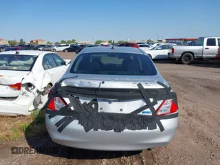 2014 Nissan Versa SV z VIN 3N1CN7AP4EL844350, wystawiony jako IAAI lot #42201655 z przebiegiem 133 117 mil mil oraz . Historia ofert i sprzedaży dostępna na DreamBid. Obrazek 6.