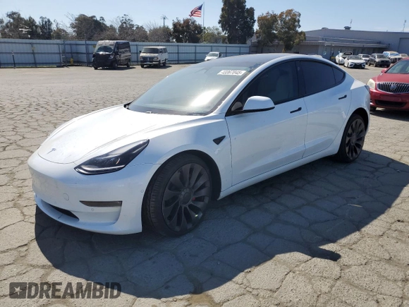 2021 Tesla Model 3 Performance with VIN 5YJ3E1EC5MF077493, listed as a Copart auction lot 48067045 with 44,285 mi miles and Salvage Title. Bid and sale history available at DreamBid. Image 1.