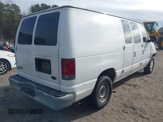 2002 Ford Econoline Cargo with VIN 1FTRE14252HB67887, listed as a IAAI auction lot 41180872 with 274,561 mi miles and . Bid and sale history available at carsss.com. Image 4.