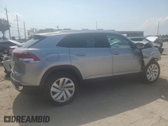 2023 Volkswagen Atlas SE z VIN 1V2WC2CA3PC219429, wystawiony jako Copart lot #54626654 z przebiegiem 12 371 mil mil oraz . Historia ofert i sprzedaży dostępna na DreamBid. Obrazek 3.
