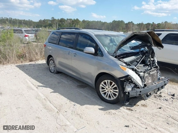 2015 Toyota Sienna XLE with VIN 5TDYK3DC6FS680950, listed as a IAAI auction lot 41864189 with 98,022 mi miles. Bid and sale history available at carsss.com. Image 1.