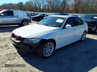 2011 BMW 3 Series 328i with VIN WBAPH7G52BNN07728, listed as a IAAI auction lot 41683017 with 140,889 mi miles. Bid and sale history available at carsss.com. Image 2.