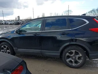 2018 Honda CR-V EX with VIN 7FARW2H57JE102324, listed as a IAAI auction lot 41469838 with 139,964 mi miles. Bid and sale history available at carsss.com. Image 14.