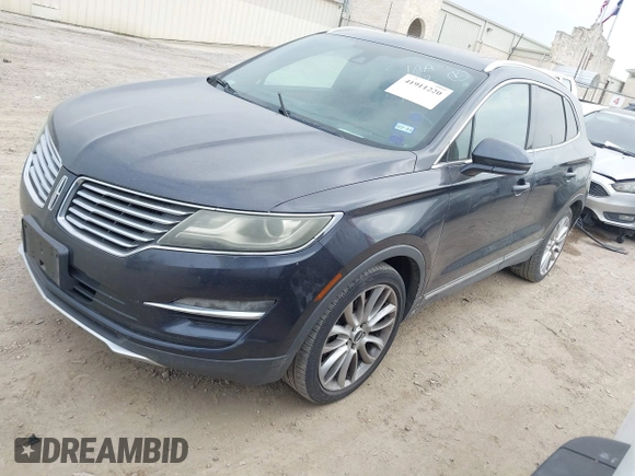 2015 Lincoln MKC with VIN 5LMCJ1A94FUJ13716, listed as a IAAI auction lot 41911220 with 194,825 mi miles. Bid and sale history available at carsss.com. Image 17.