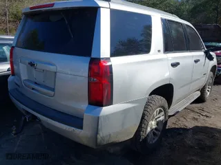 2015 Chevrolet Tahoe LT with VIN 1GNSCBKCXFR555438, listed as a IAAI auction lot 41624792 with 187,959 mi miles. Bid and sale history available at carsss.com. Image 4.