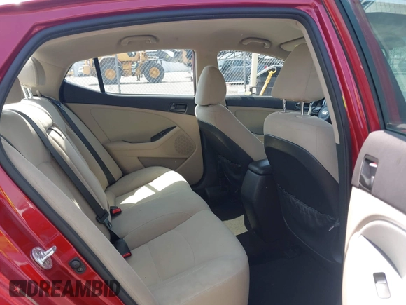 2015 Kia Optima LX z VIN 5XXGM4A72FG407864, wystawiony jako IAAI lot #42295392 z przebiegiem 177 485 mil mil oraz . Historia ofert i sprzedaży dostępna na DreamBid. Obrazek 8.